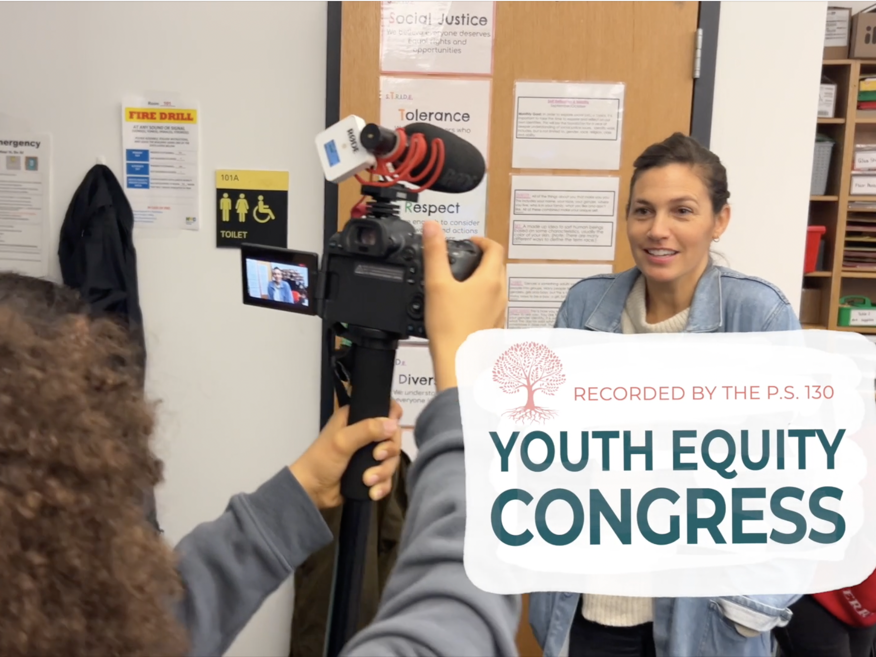 students filming a parent